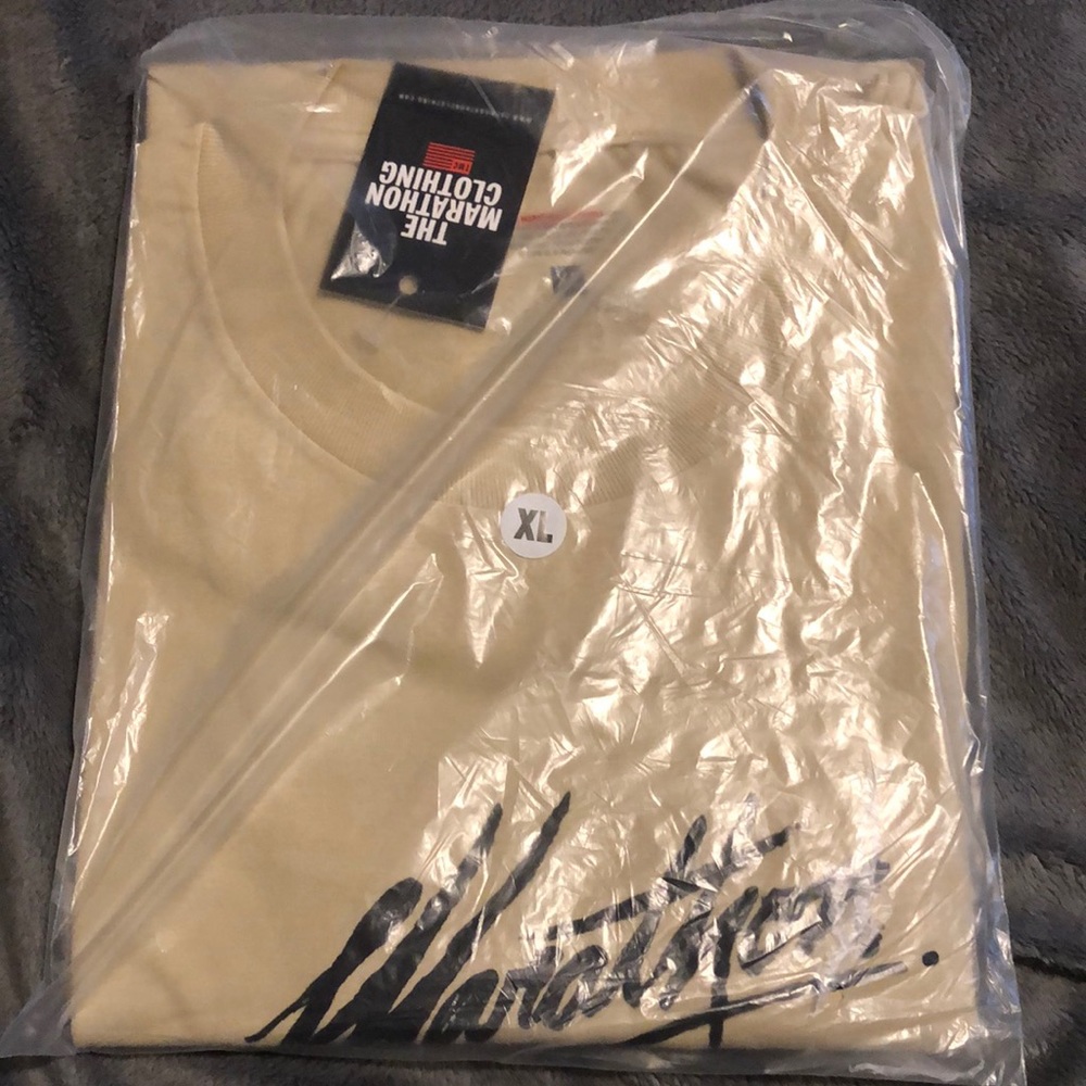 The Marathon Clothing Brand.  Brand new Marathon T-Shirt in original packaging.